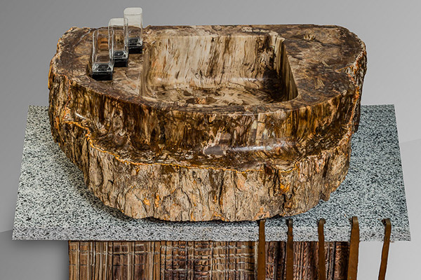 Hand finishing a fossil wood sink Hand finishing a fossil wood sink